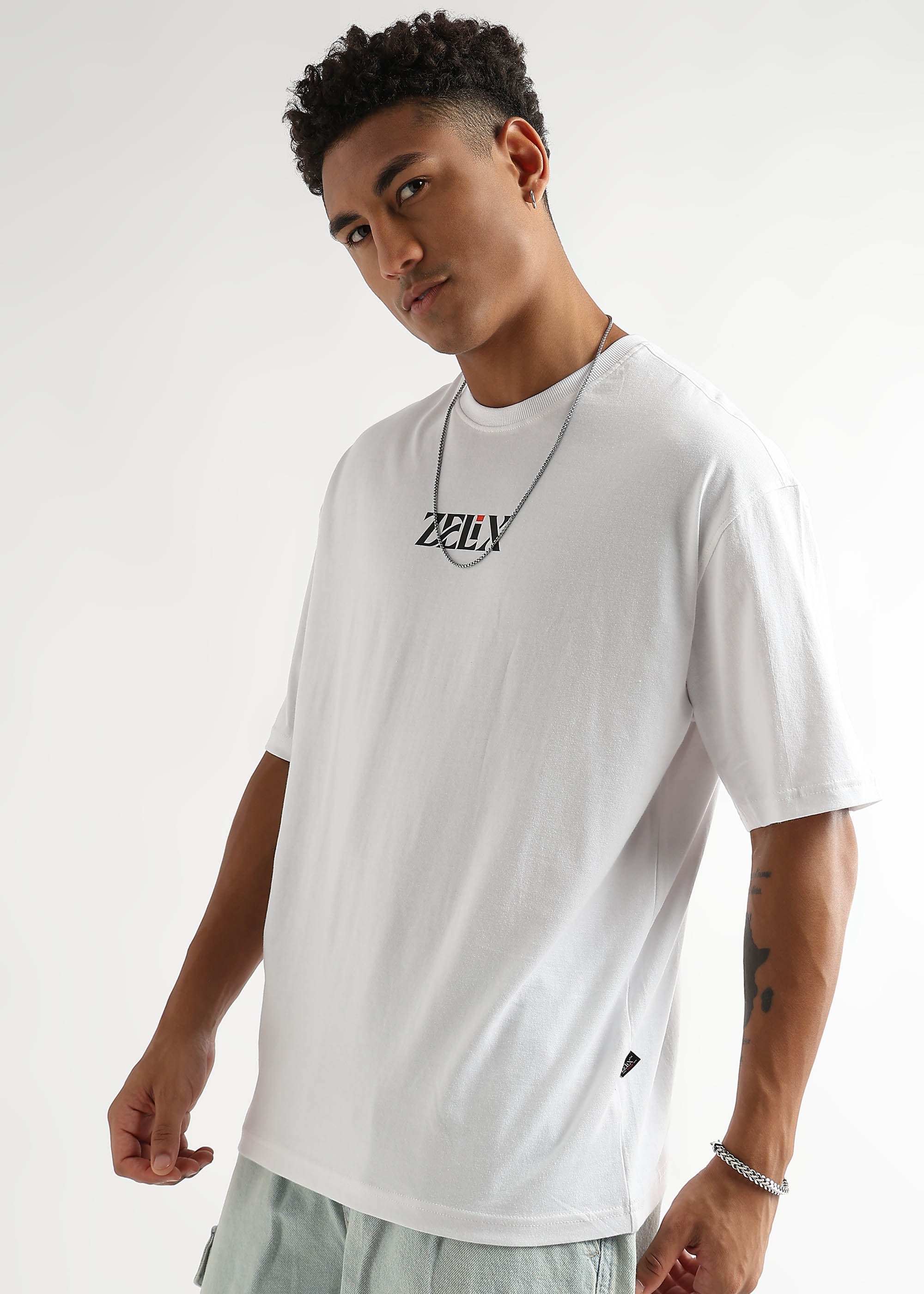 Unisex white oversized streetwear “Positive Vibes” shirt