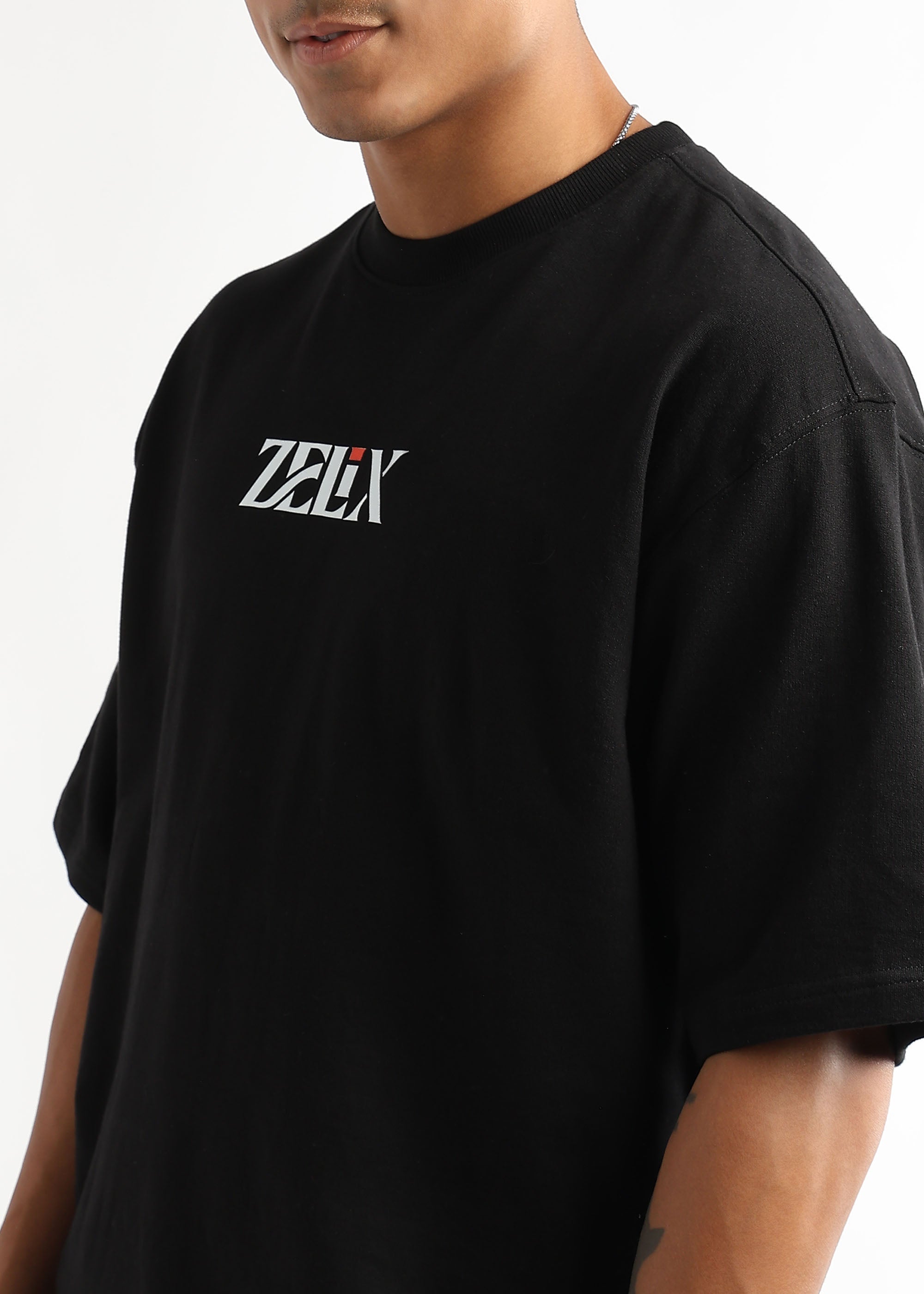 Casual oversized black t-shirt with slogan print