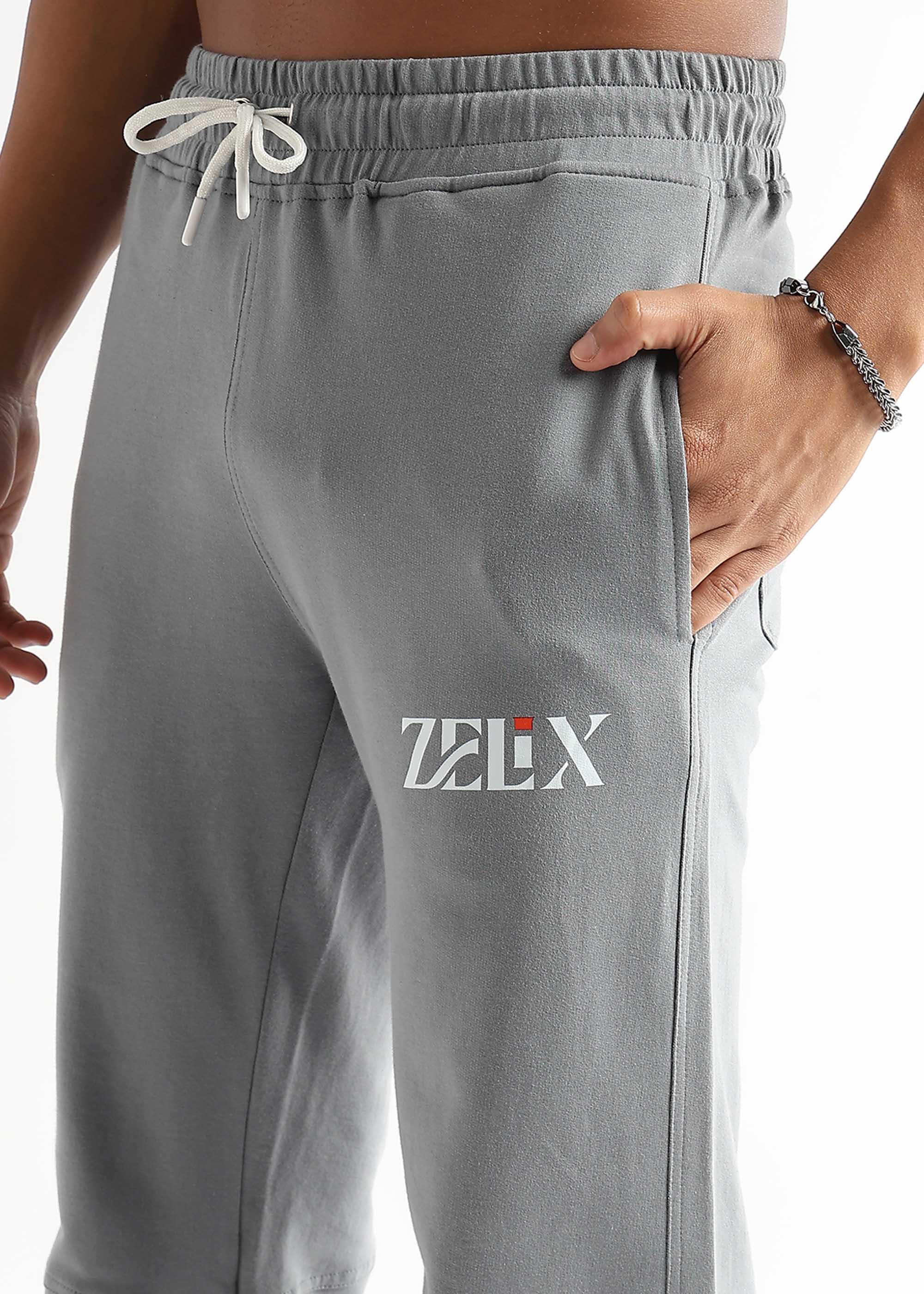 Tapered fit grey graffiti streetwear joggers