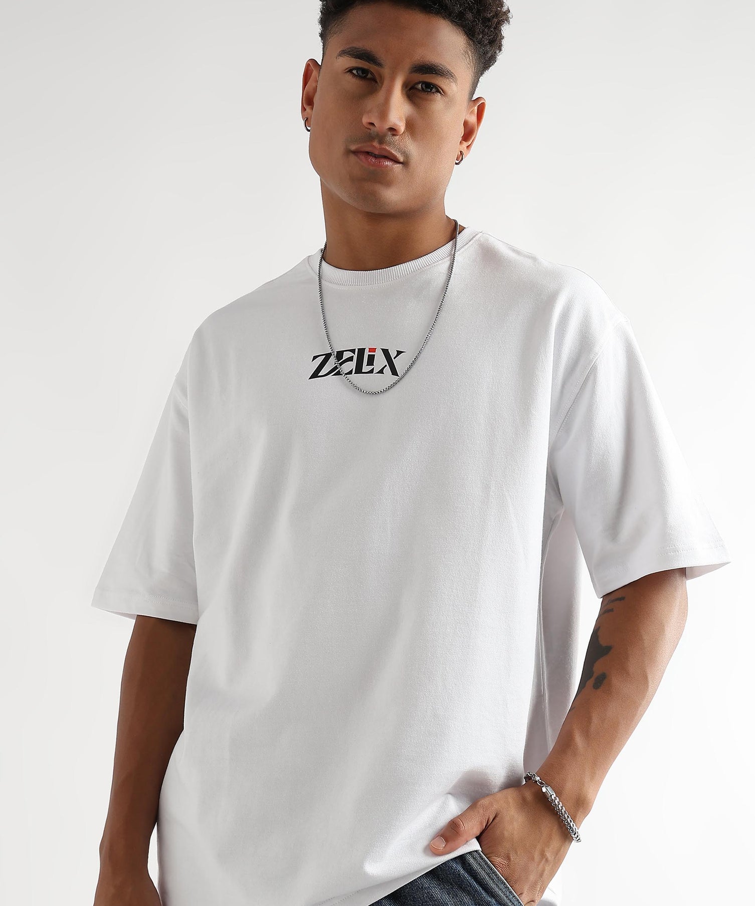 White oversized “Classic Dad Vibes” graphic t-shirt