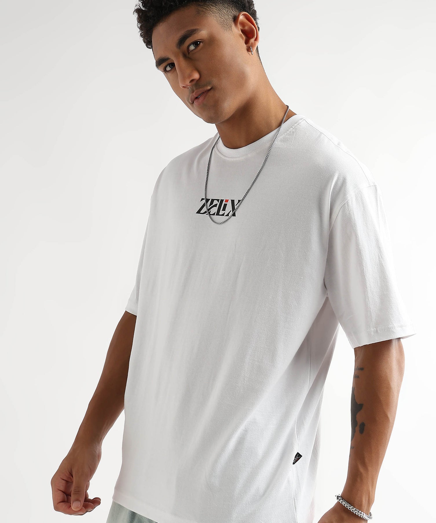 Unisex white oversized streetwear “Positive Vibes” shirt
