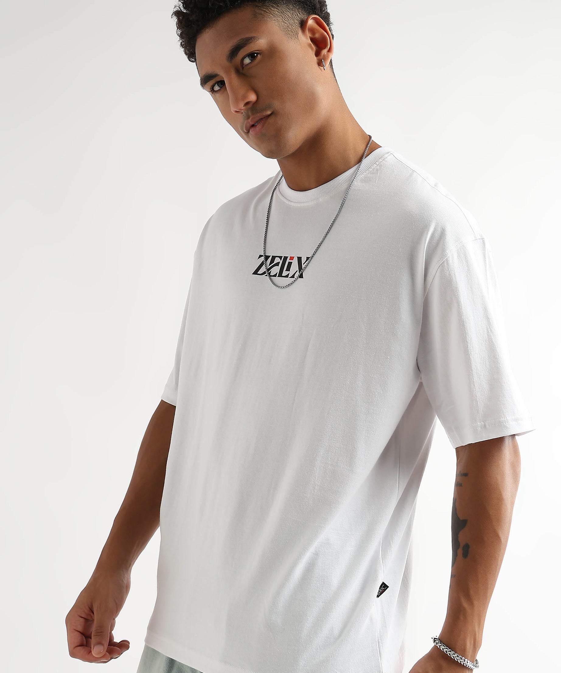 Unisex white oversized streetwear “Positive Vibes” shirt