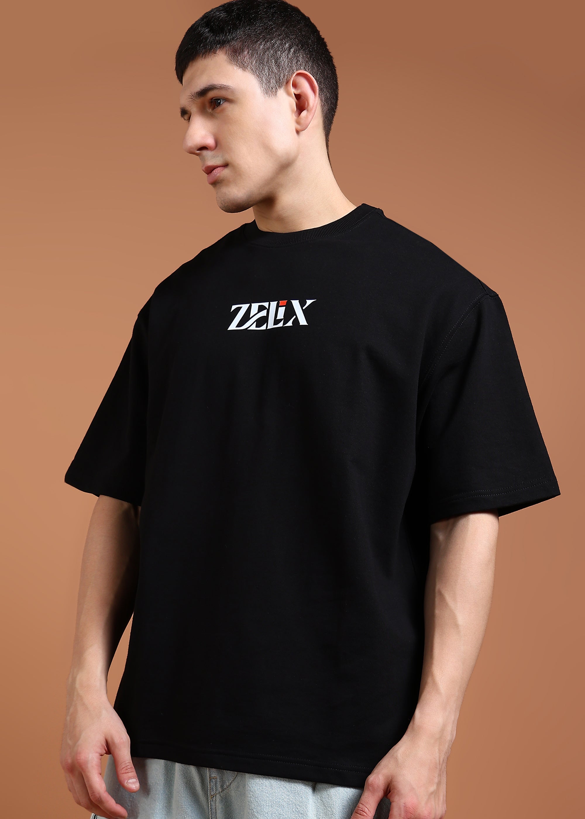 Drop shoulder relaxed fit black strength print shirt