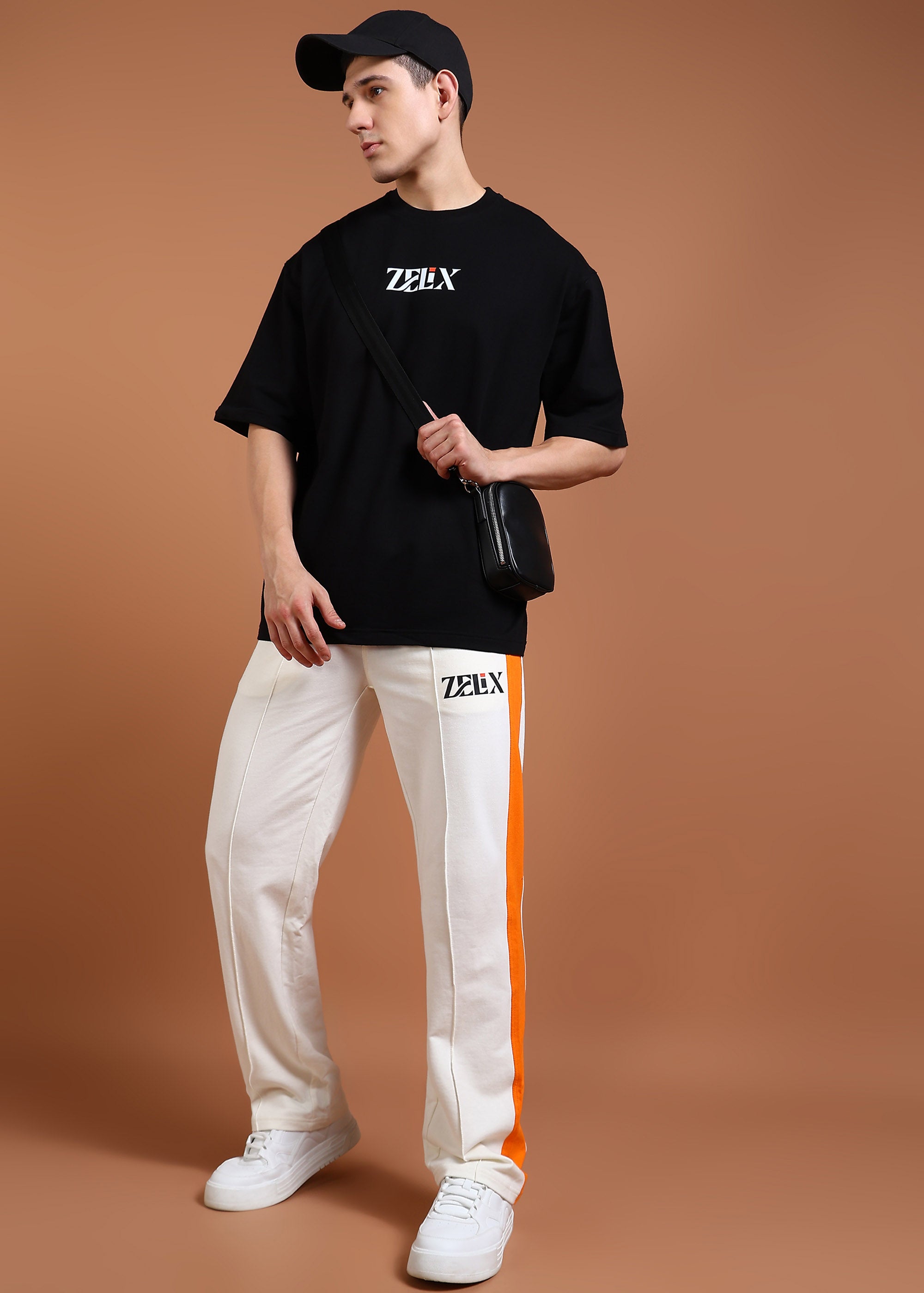 Contrast jogger pants off-white with orange design