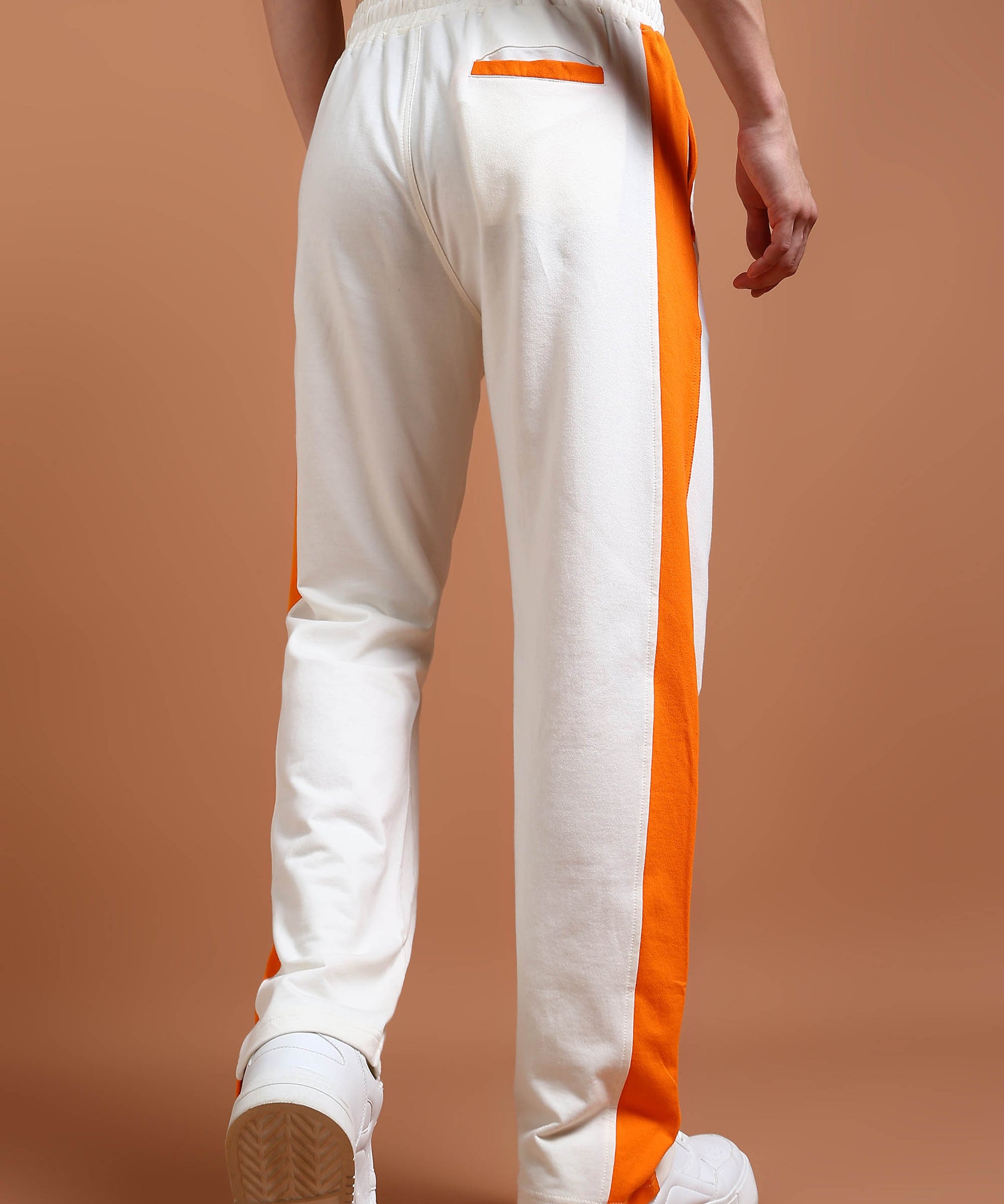 Streetwear tapered joggers in off-white and orange