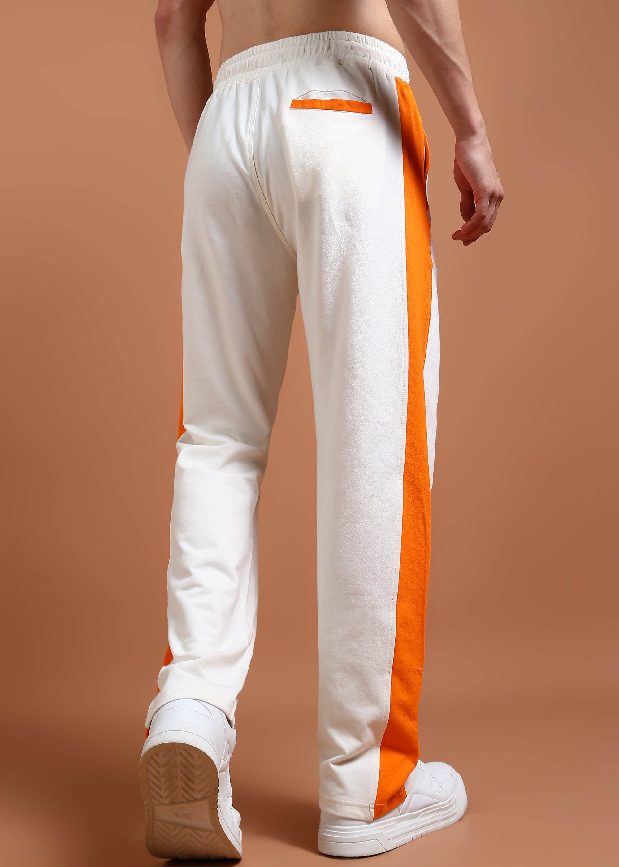 Streetwear tapered joggers in off-white and orange