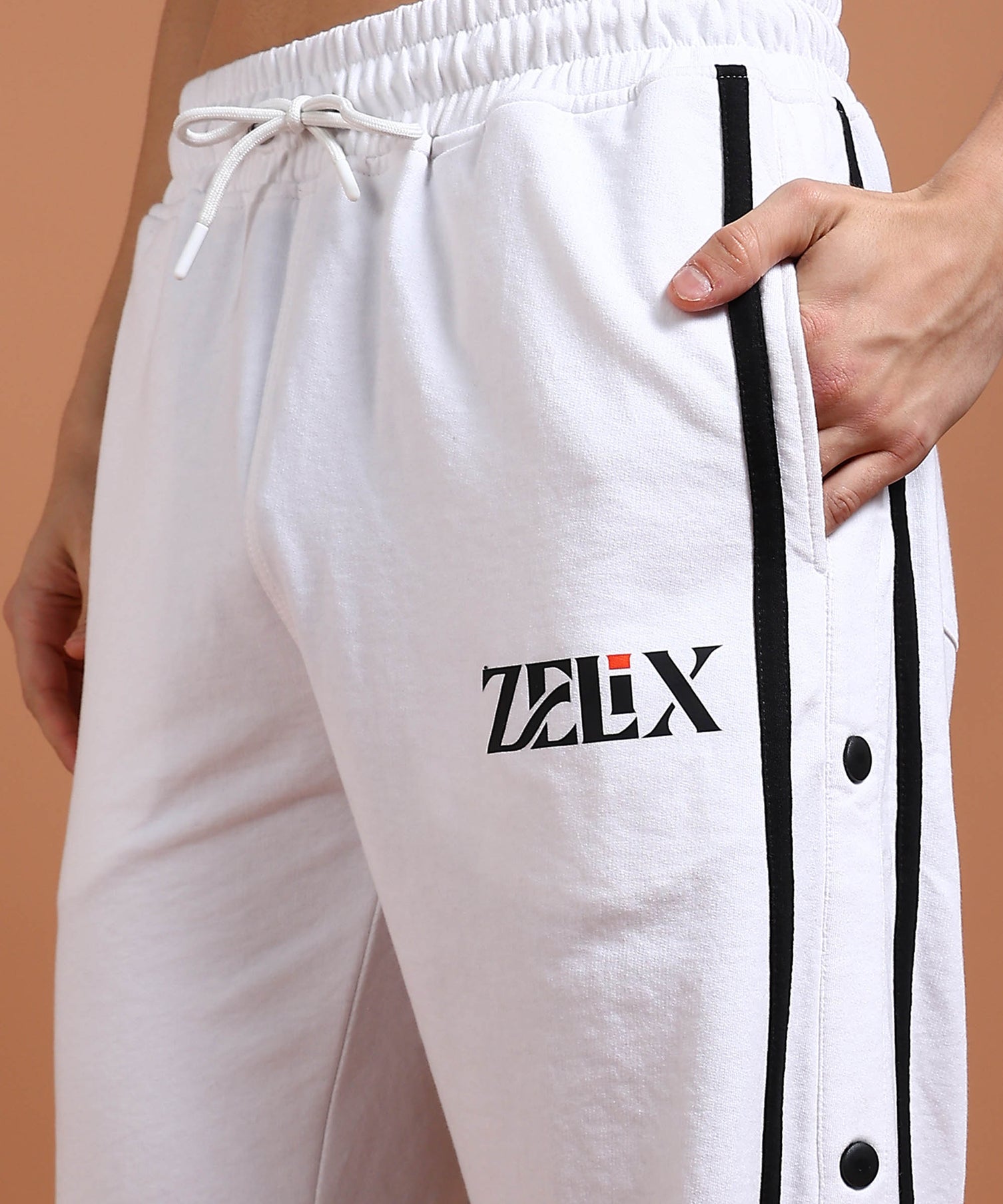 Unisex white joggers with elegant striped design