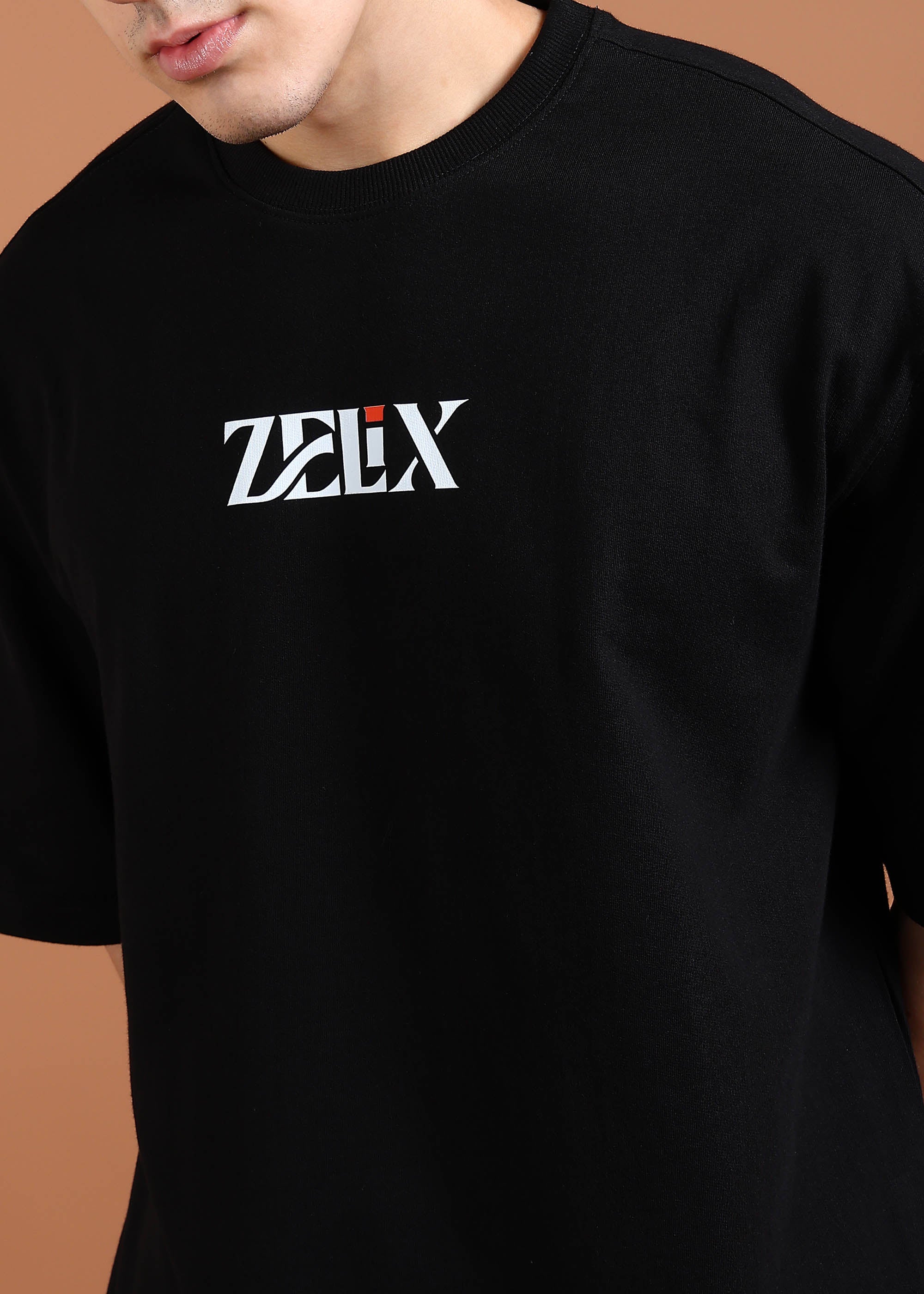 Men’s and women’s bold print black oversized tee