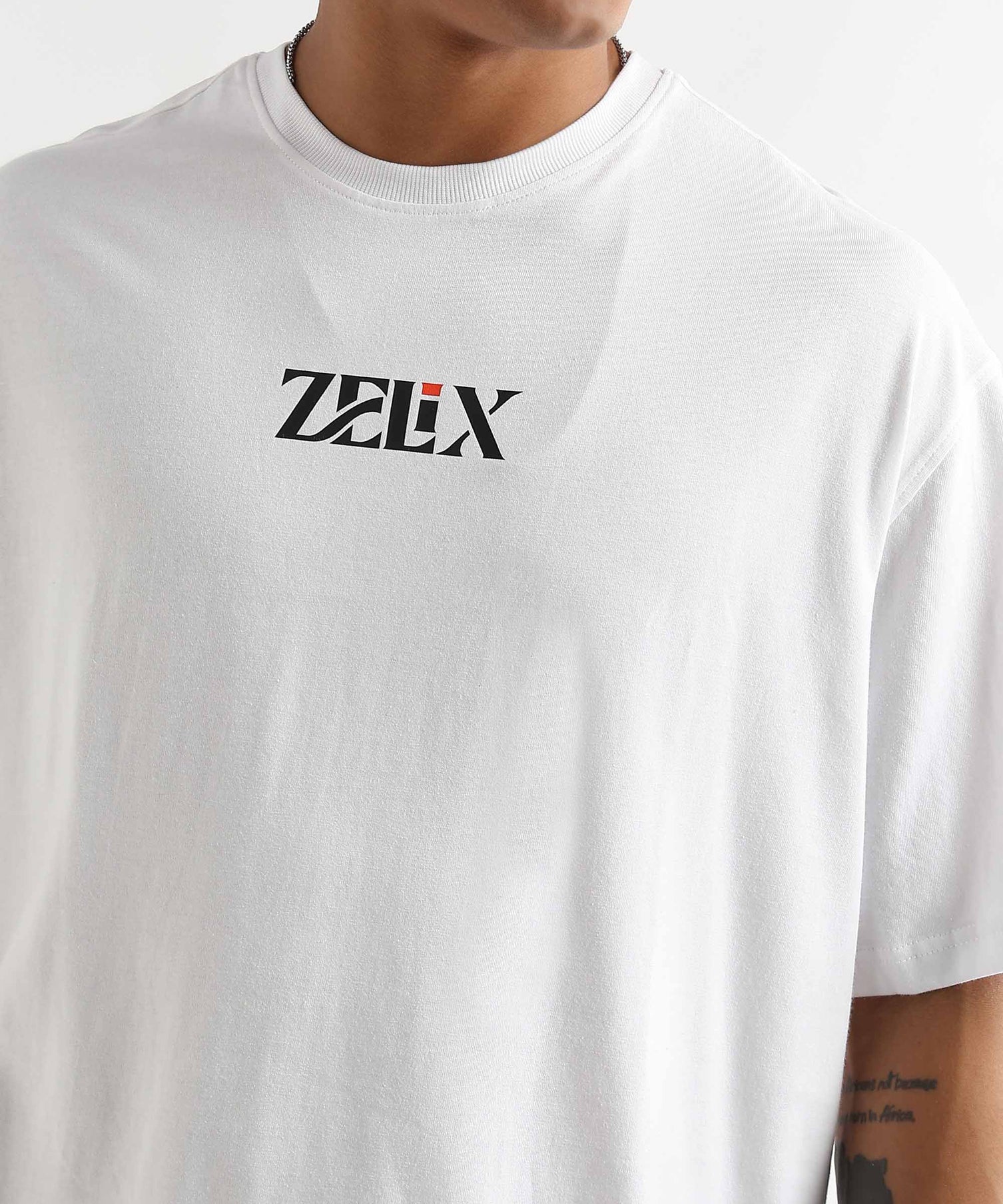 Trendy oversized casual white “Positive Vibes” tee