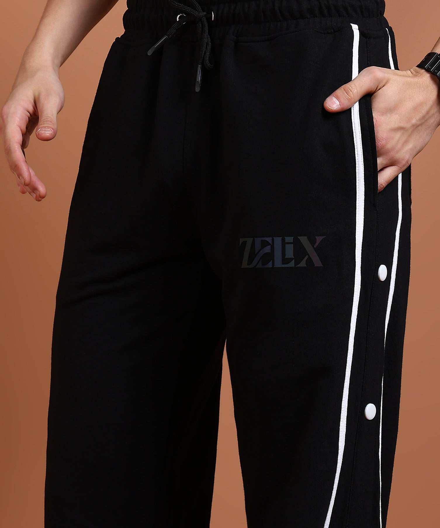 Athletic black joggers with striped panel design