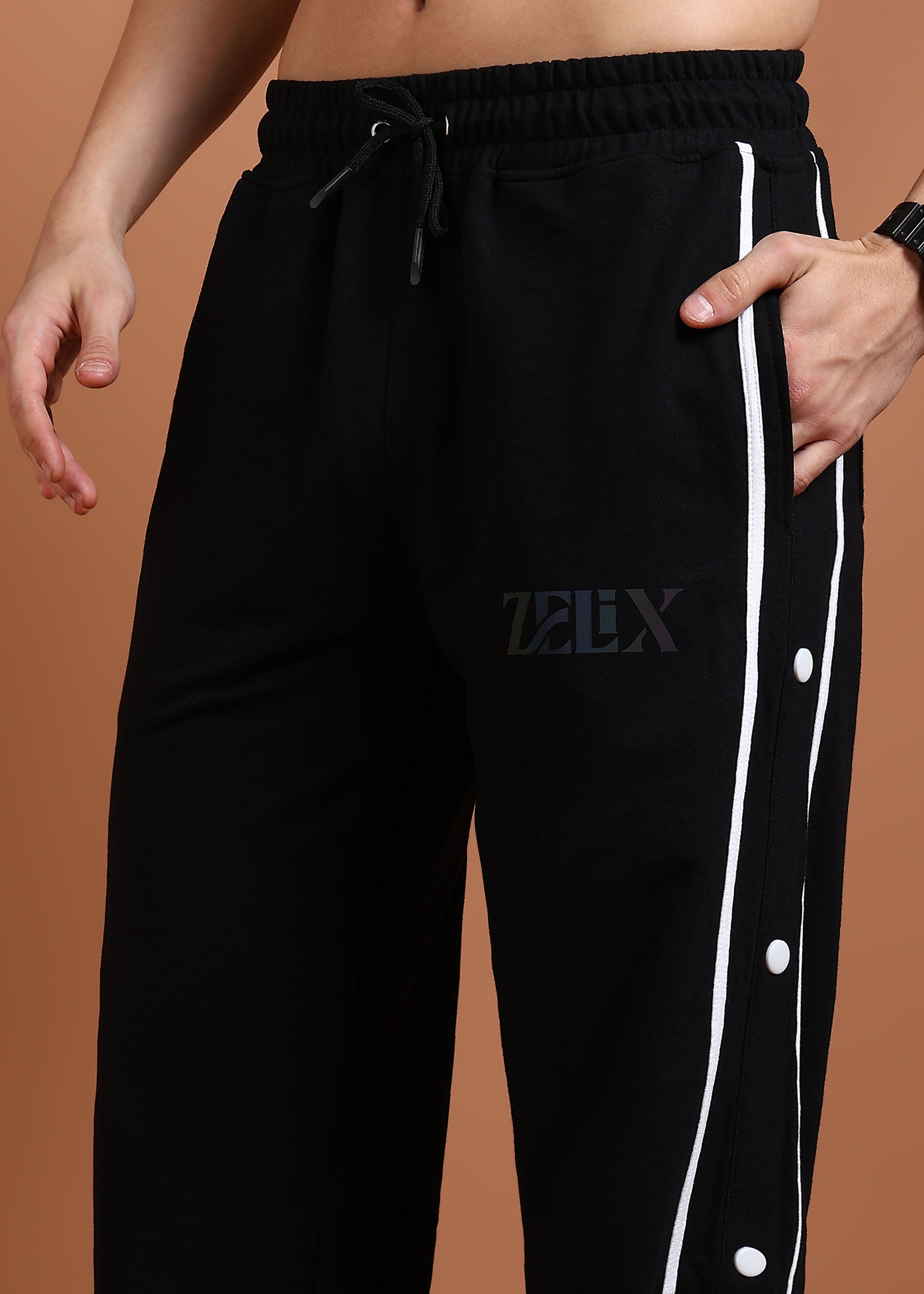 Athletic black joggers with striped panel design