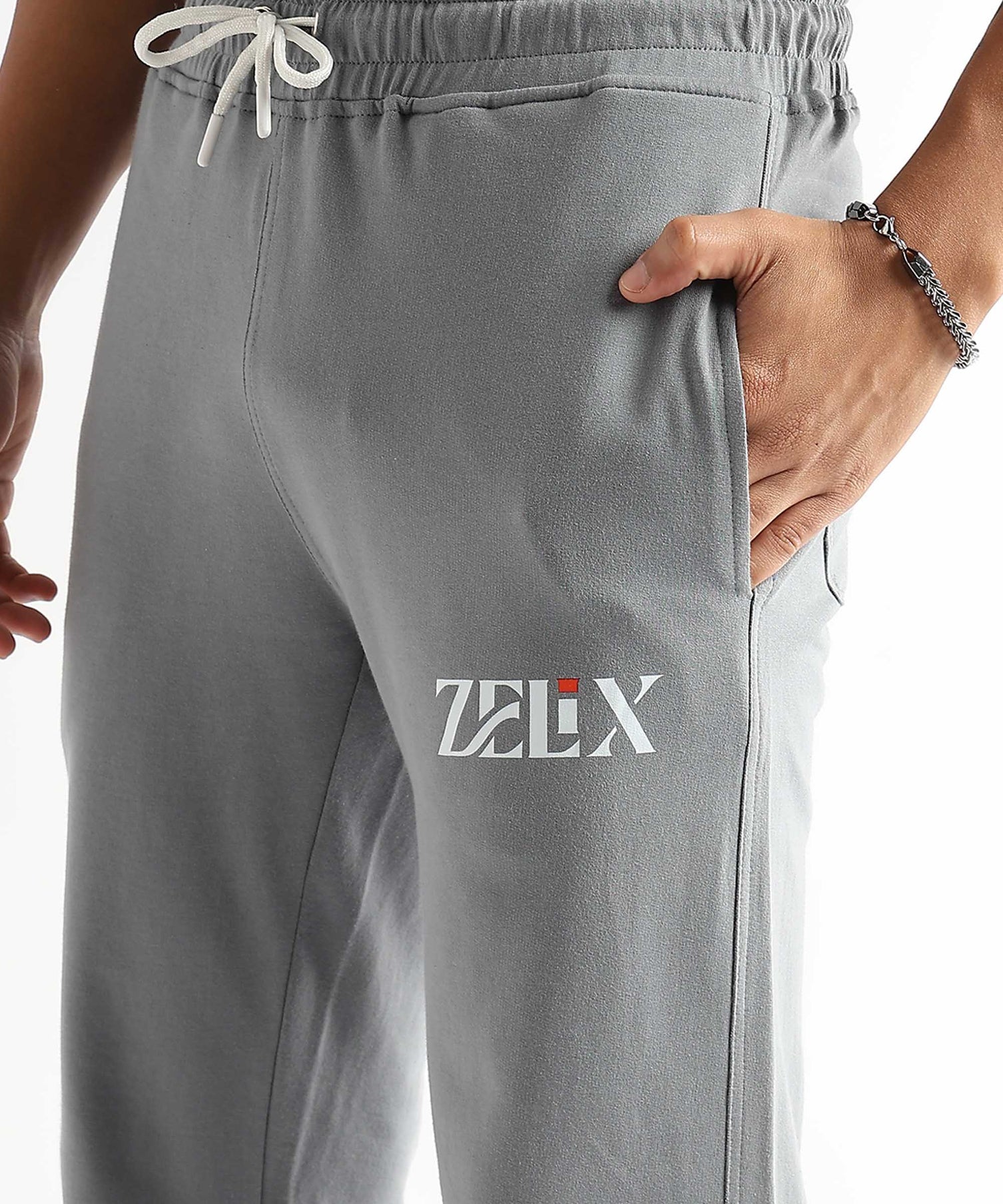Tapered fit grey graffiti streetwear joggers